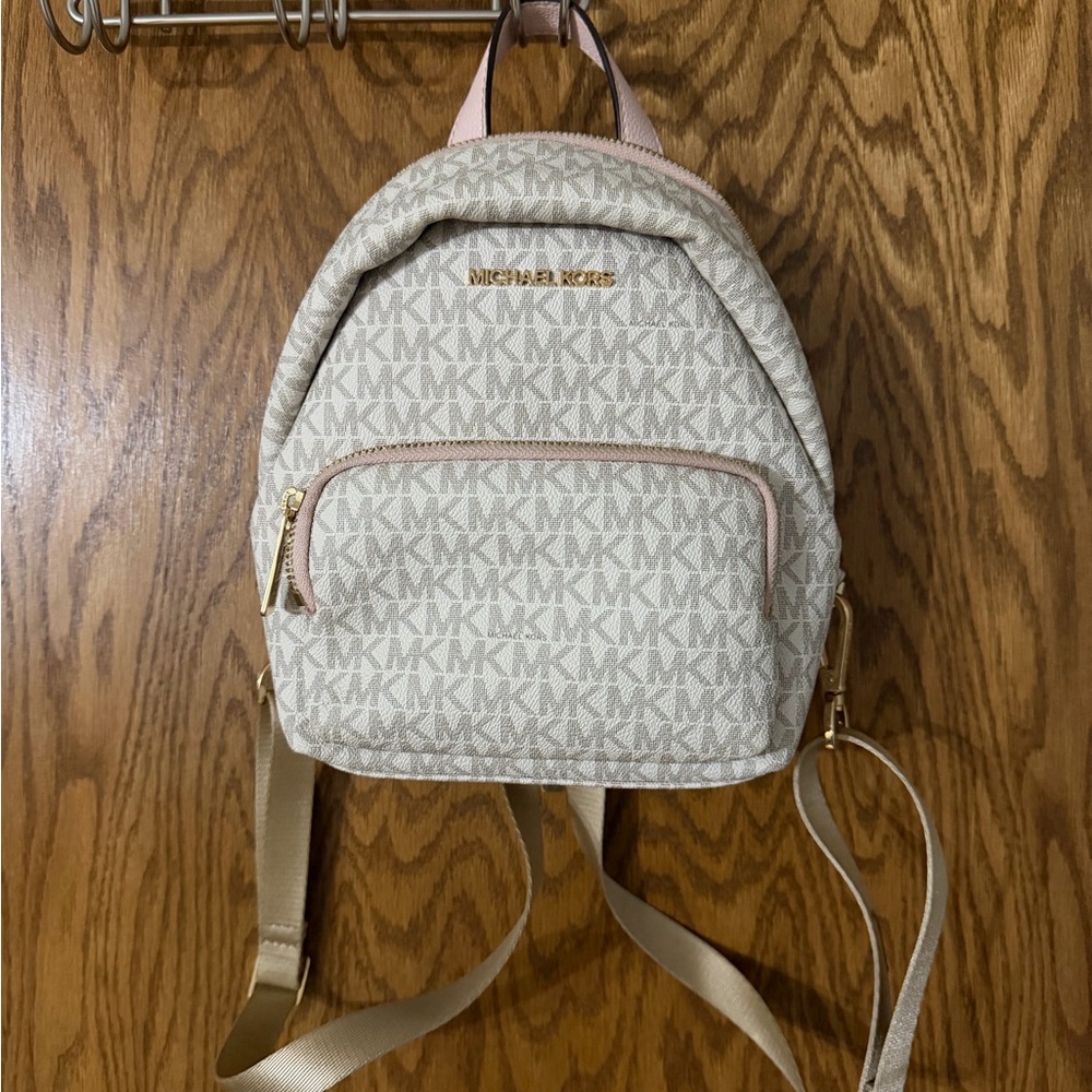 Michael Kors Mini Monogram Backpack in Pink and Gold